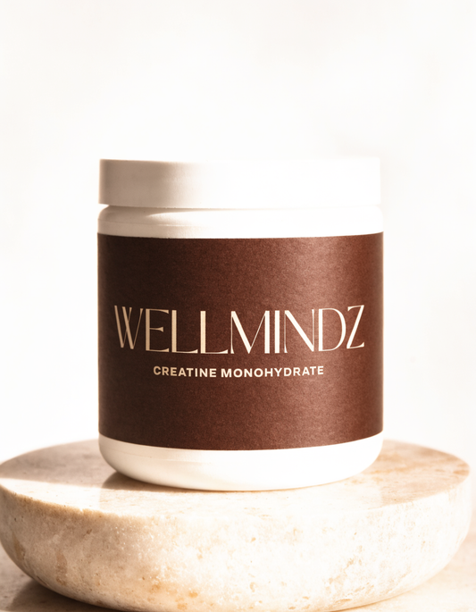 WELLMINDZ Creatine jar with chocolate brown label on cream background